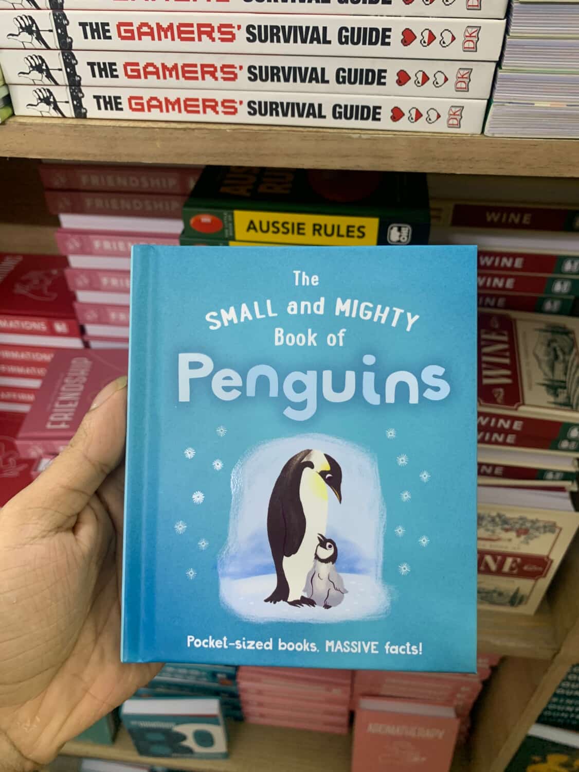 The Small and Mighty Book of Penguins: Pocket-sized books, MASSIVE facts! (Original Imported) (Hardcover Coloured Edition)